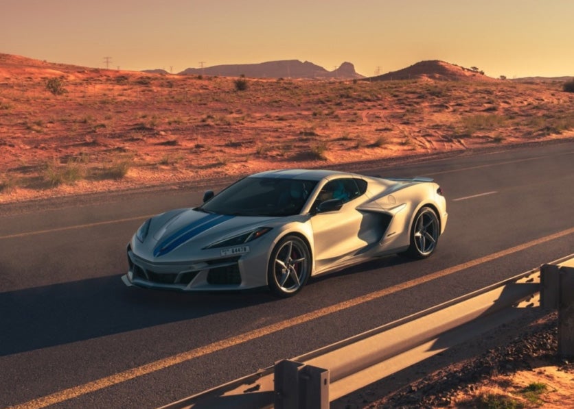 Bomnin Corvette in Miami FL Corvette at golden hour driving on highway