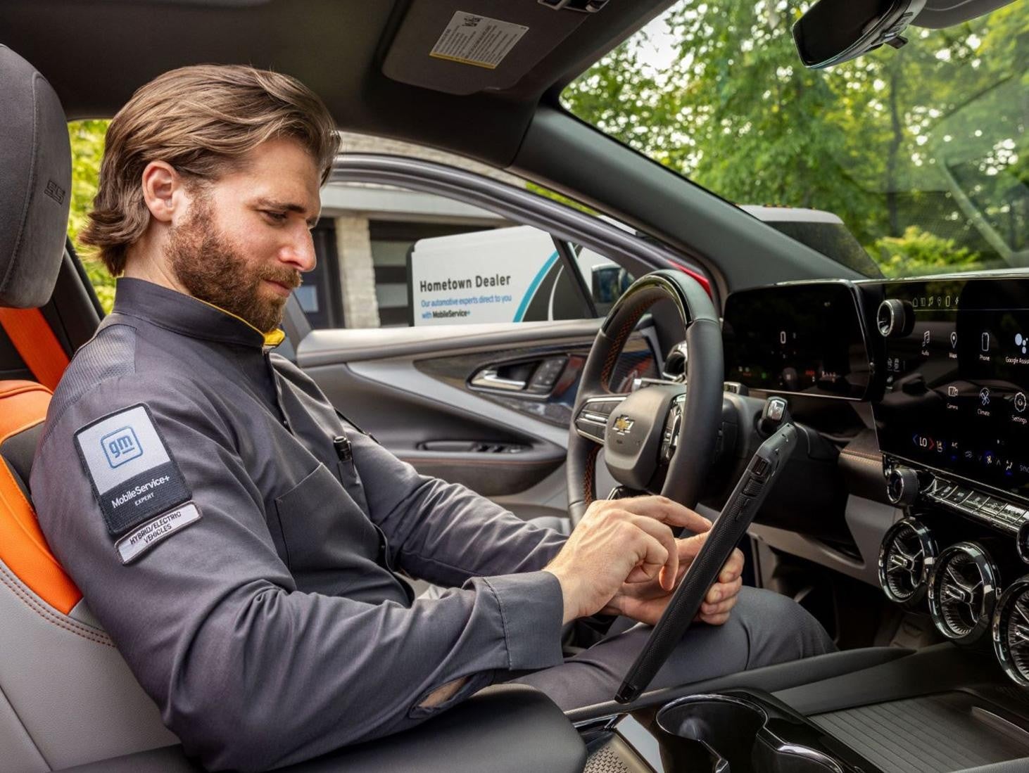 Bomnin Corvette in Miami FL technician inside a vehicle
